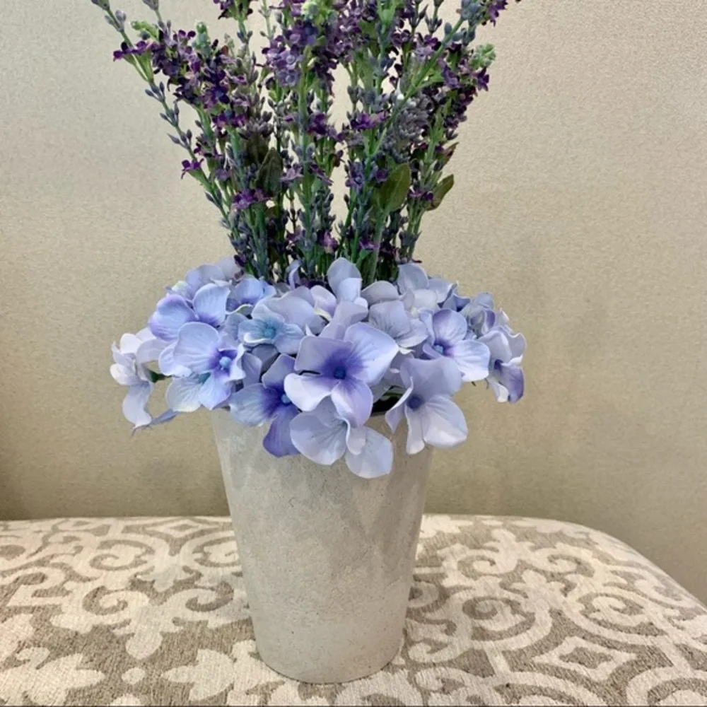 Purple Flowers in Cream Resin Vase‎